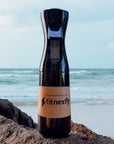 Spray detergente Fitnexfly per tappetini yoga e pilates, sostenibile e perfetto per l'uso all'aperto.